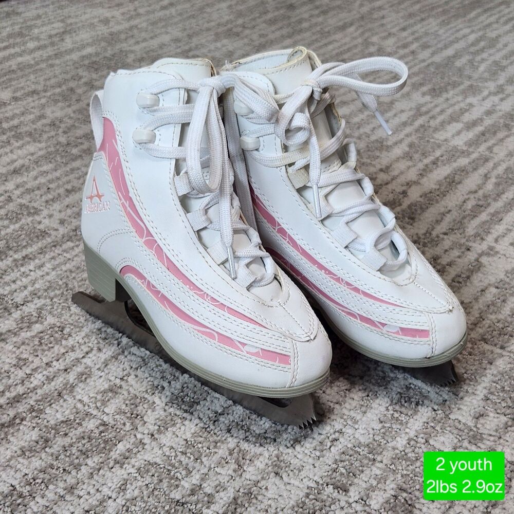 American Athletic youth Softboot figure skates with pink trim size 2